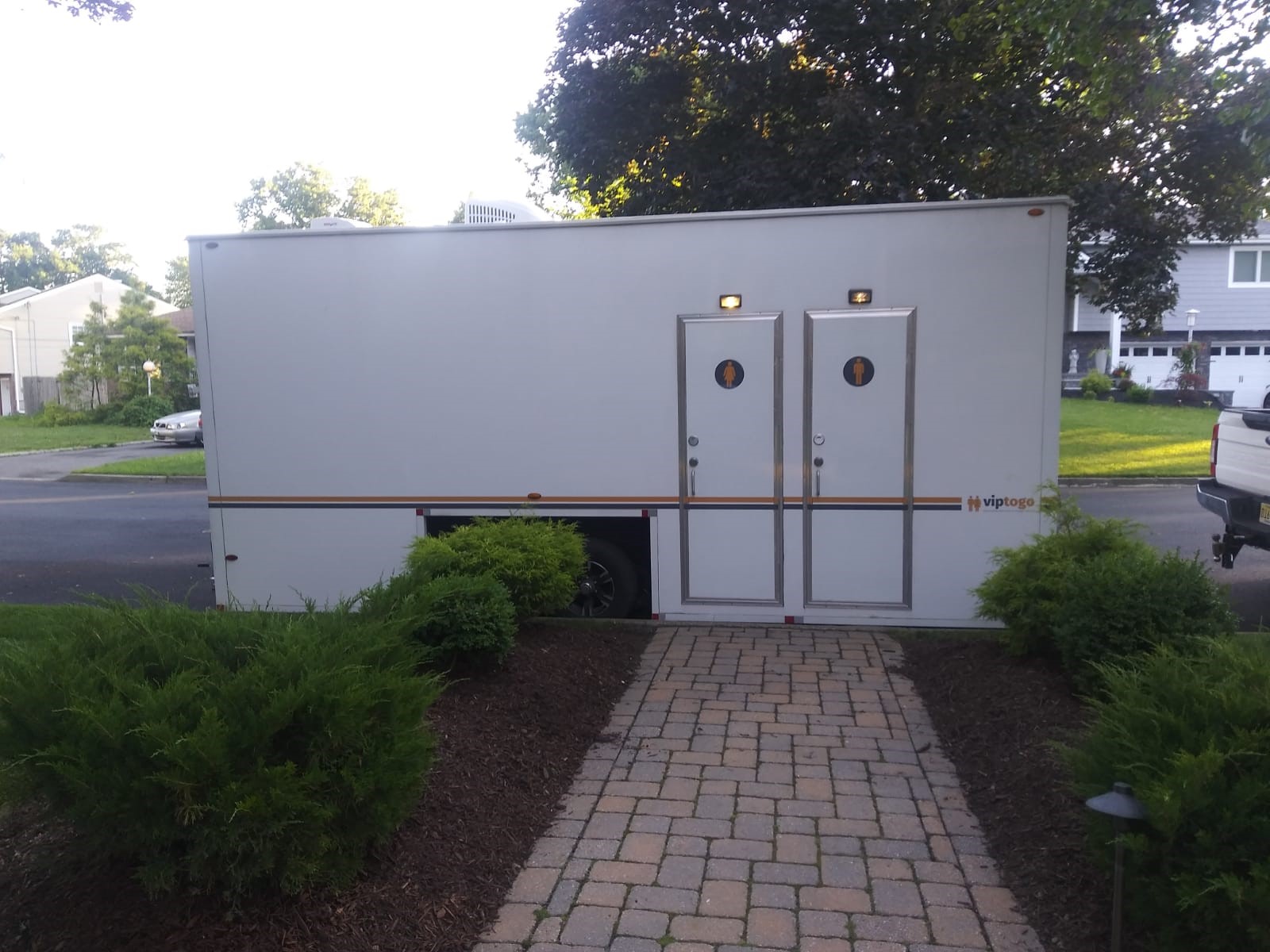 Outdoor restroom at end of walkway