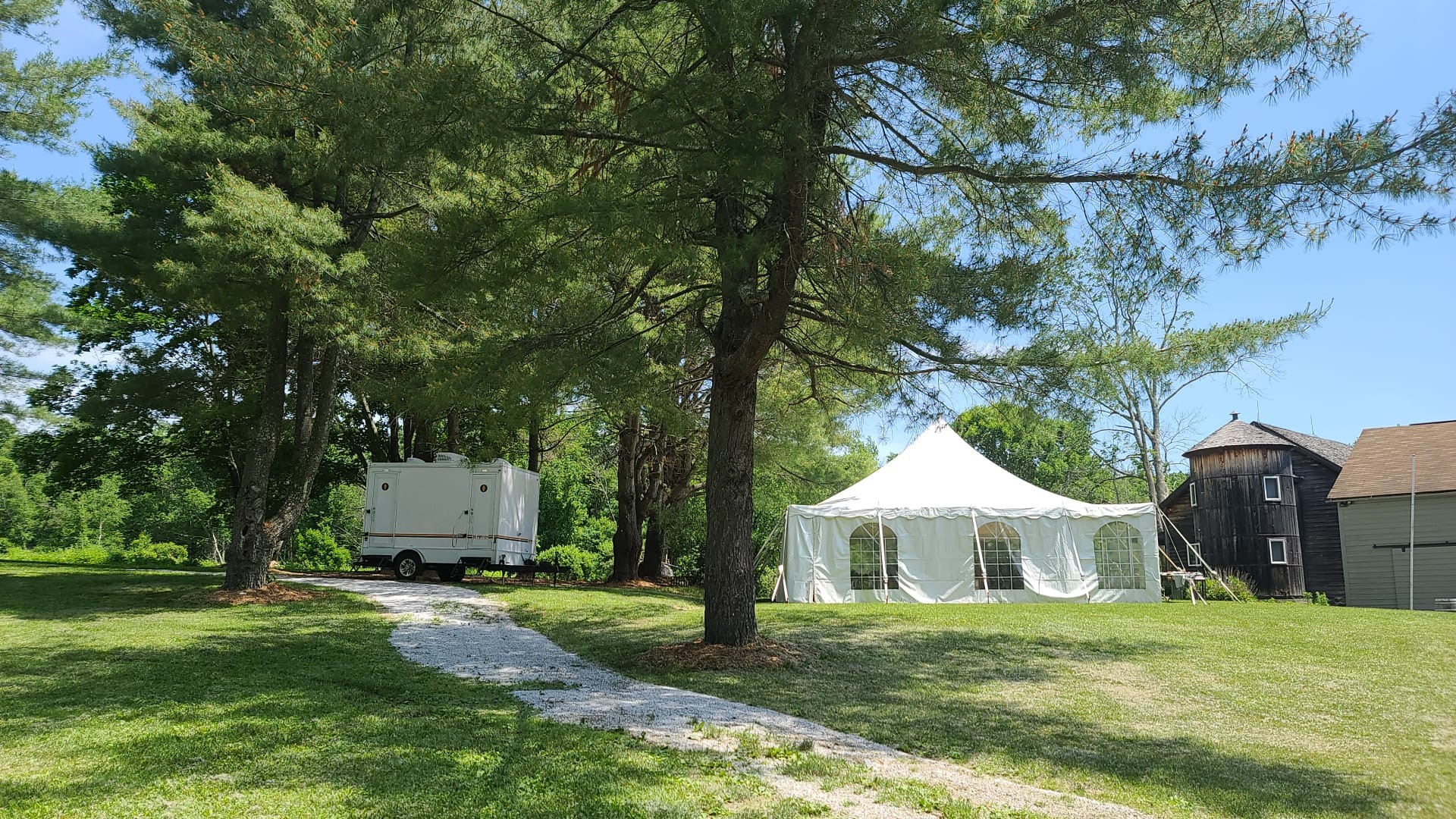 bathroom trailer near tent