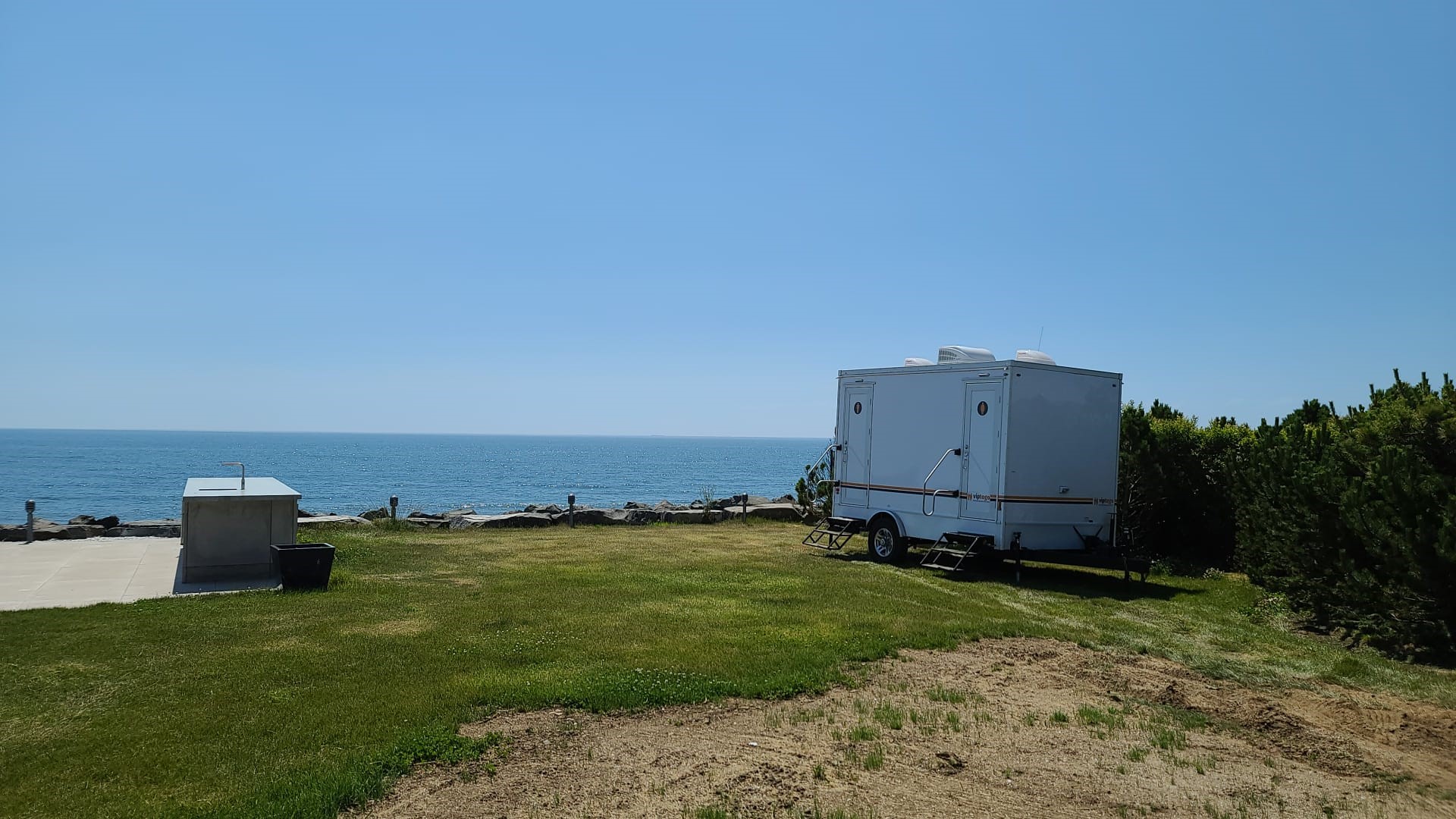 mobile restroom trailer near water