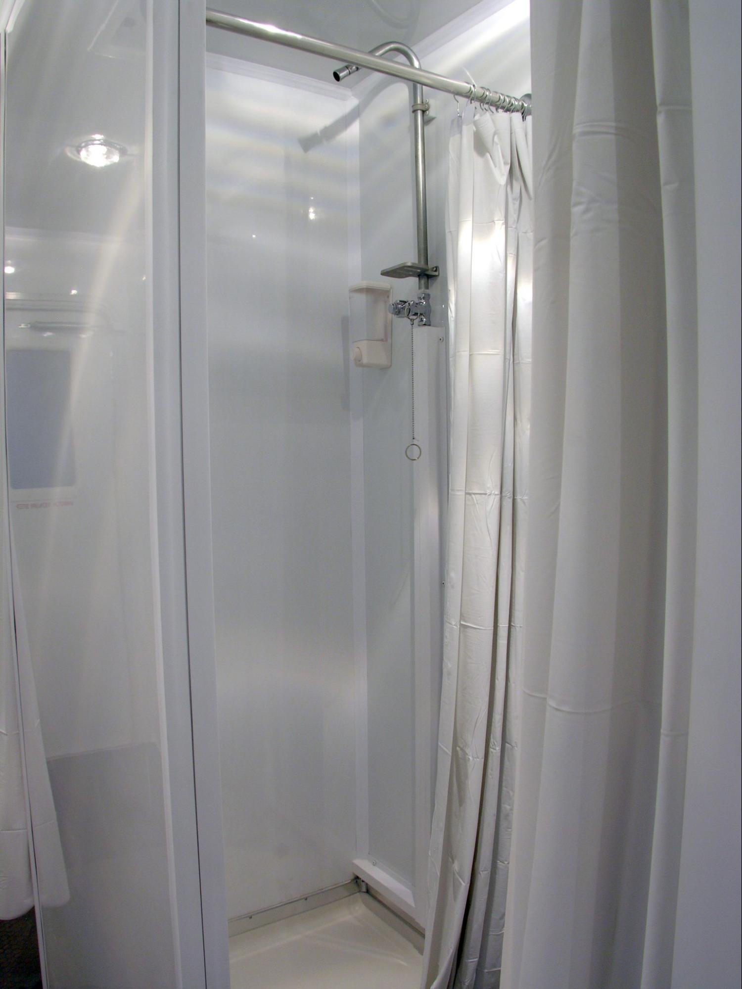 shower stall in mobile restroom trailer