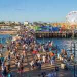 people on beach amusement park