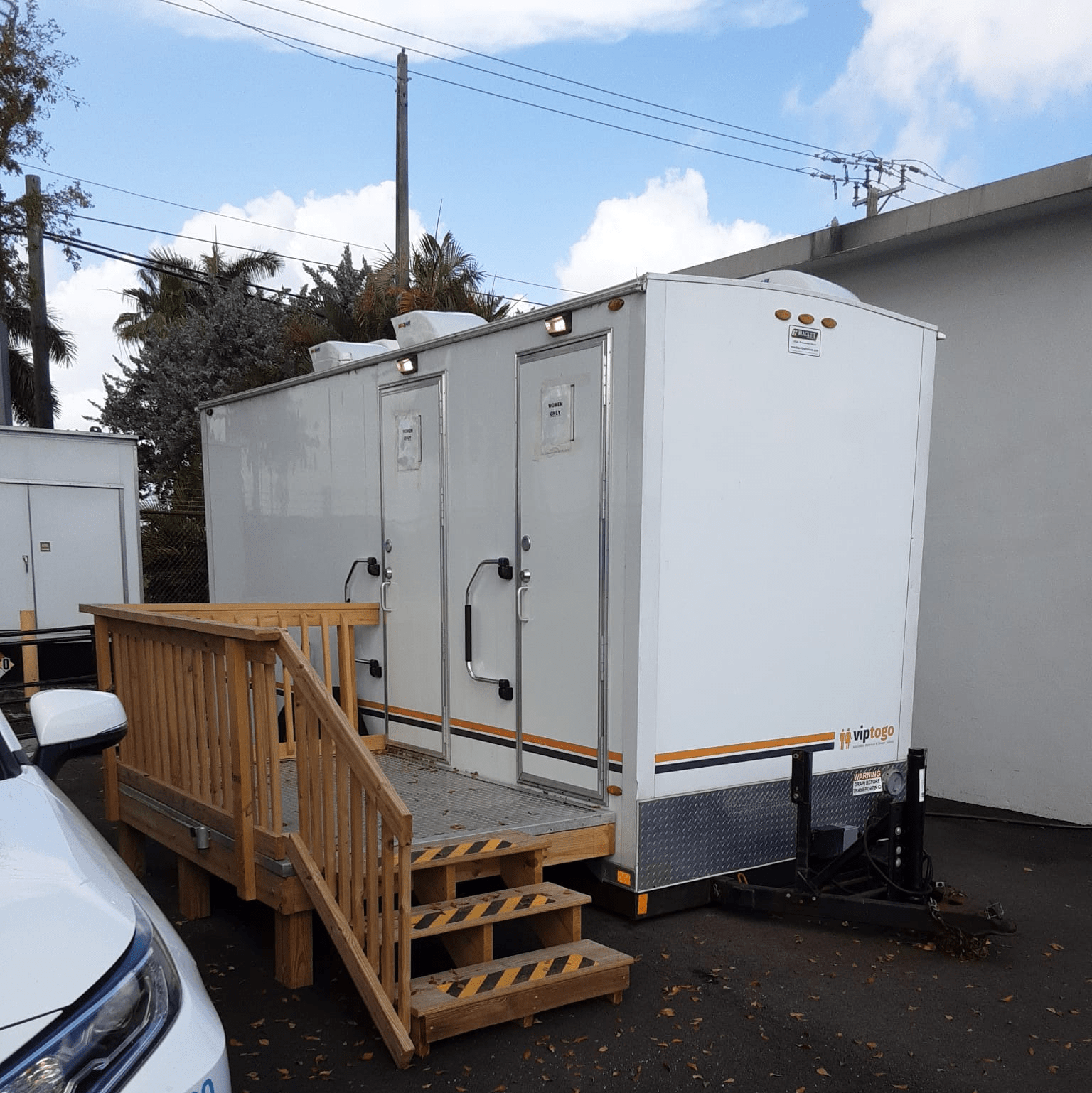 mobile restroom trailer rental with access steps