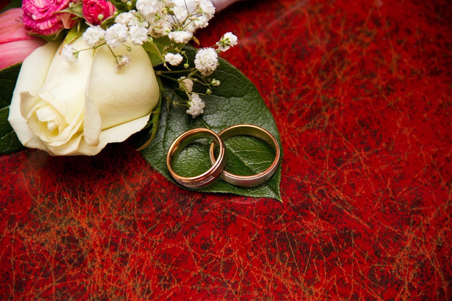 rings and flowers for engagement party celebration